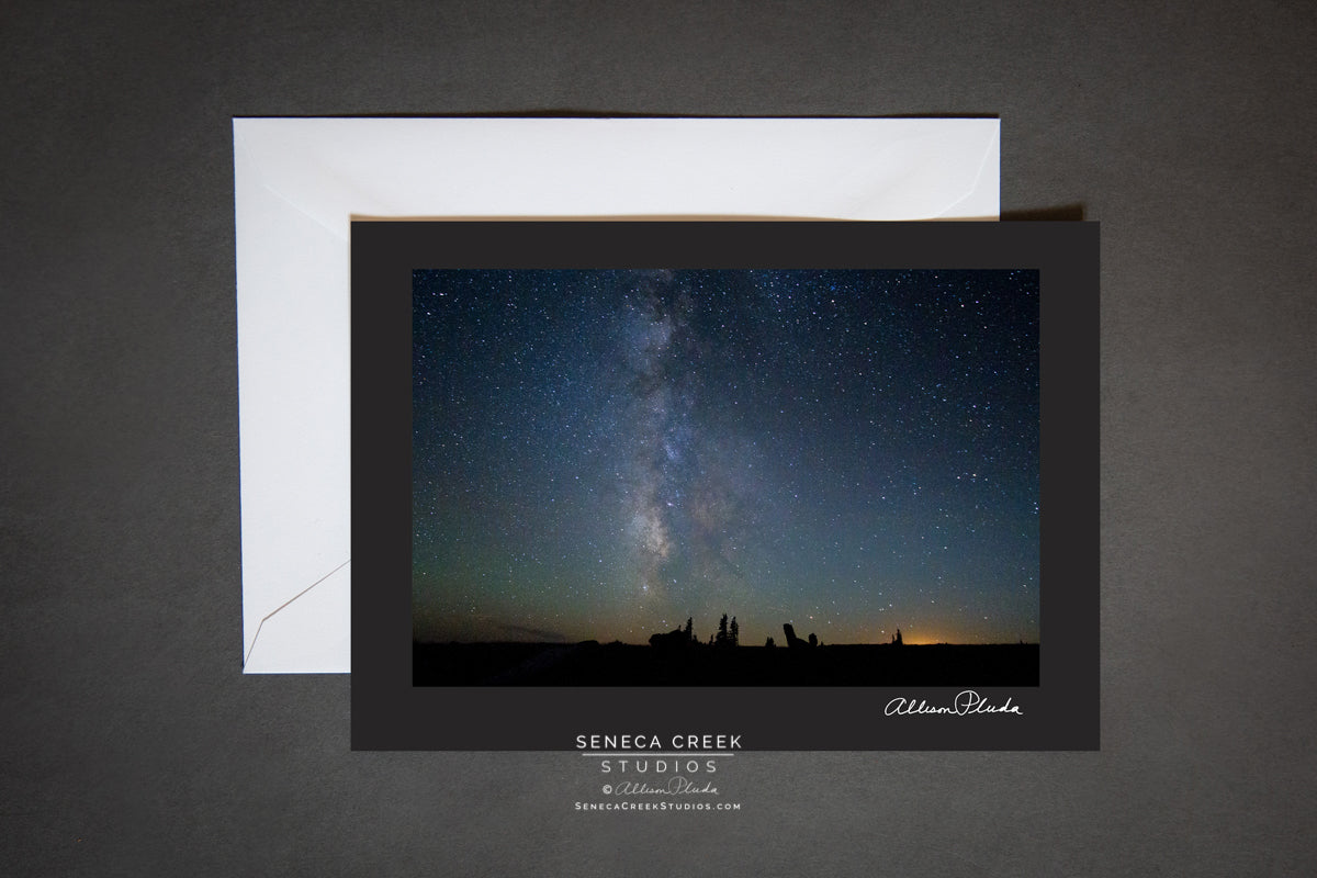 blank card with envelope. cover is photo of the milkyway in the night sky with the glow of the lights from Laramie Wyoming