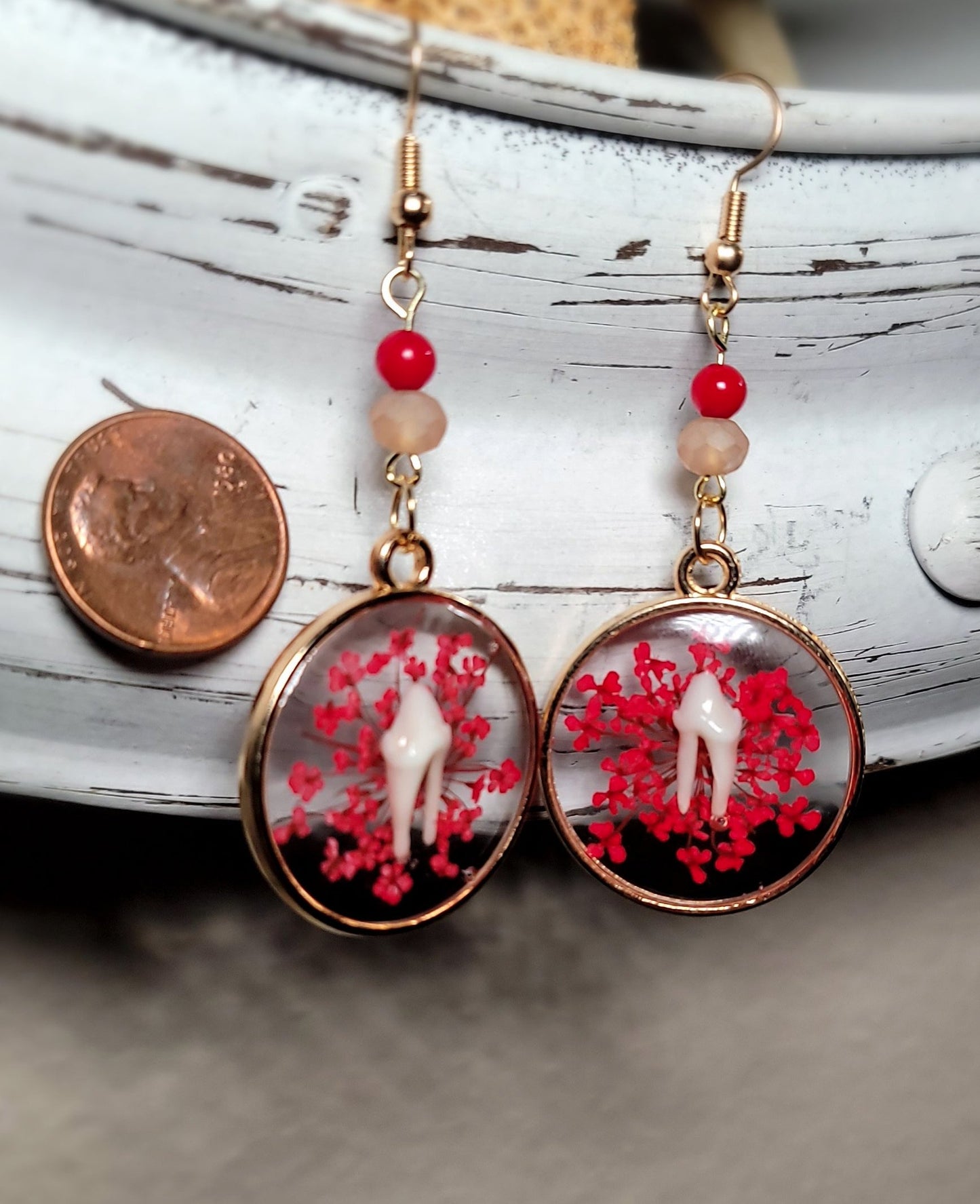 Raccoon Teeth with Red Floral Earrings