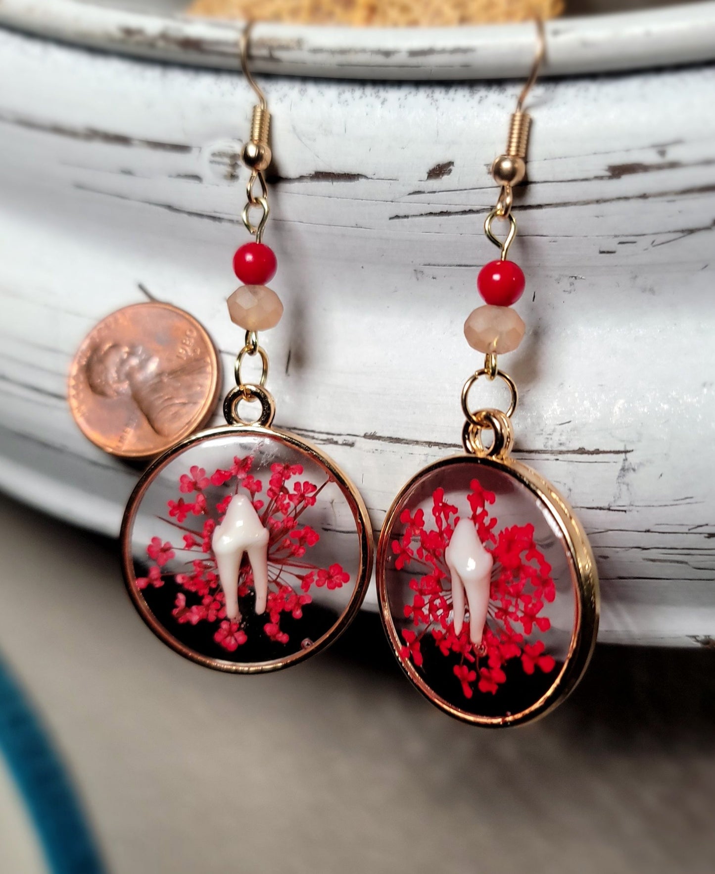 Raccoon Teeth with Red Floral Earrings