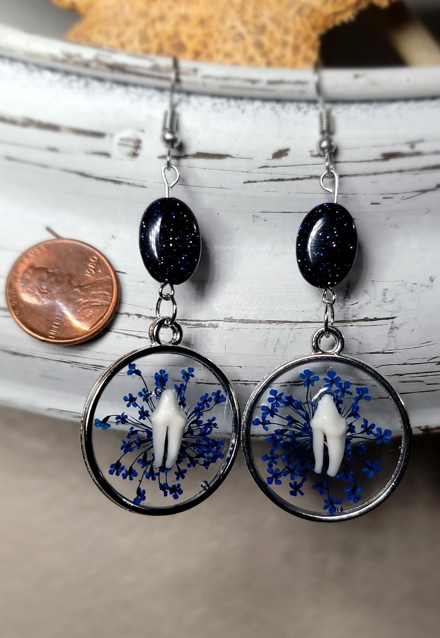 Raccoon Teeth with Dark Blue Floral Earrings