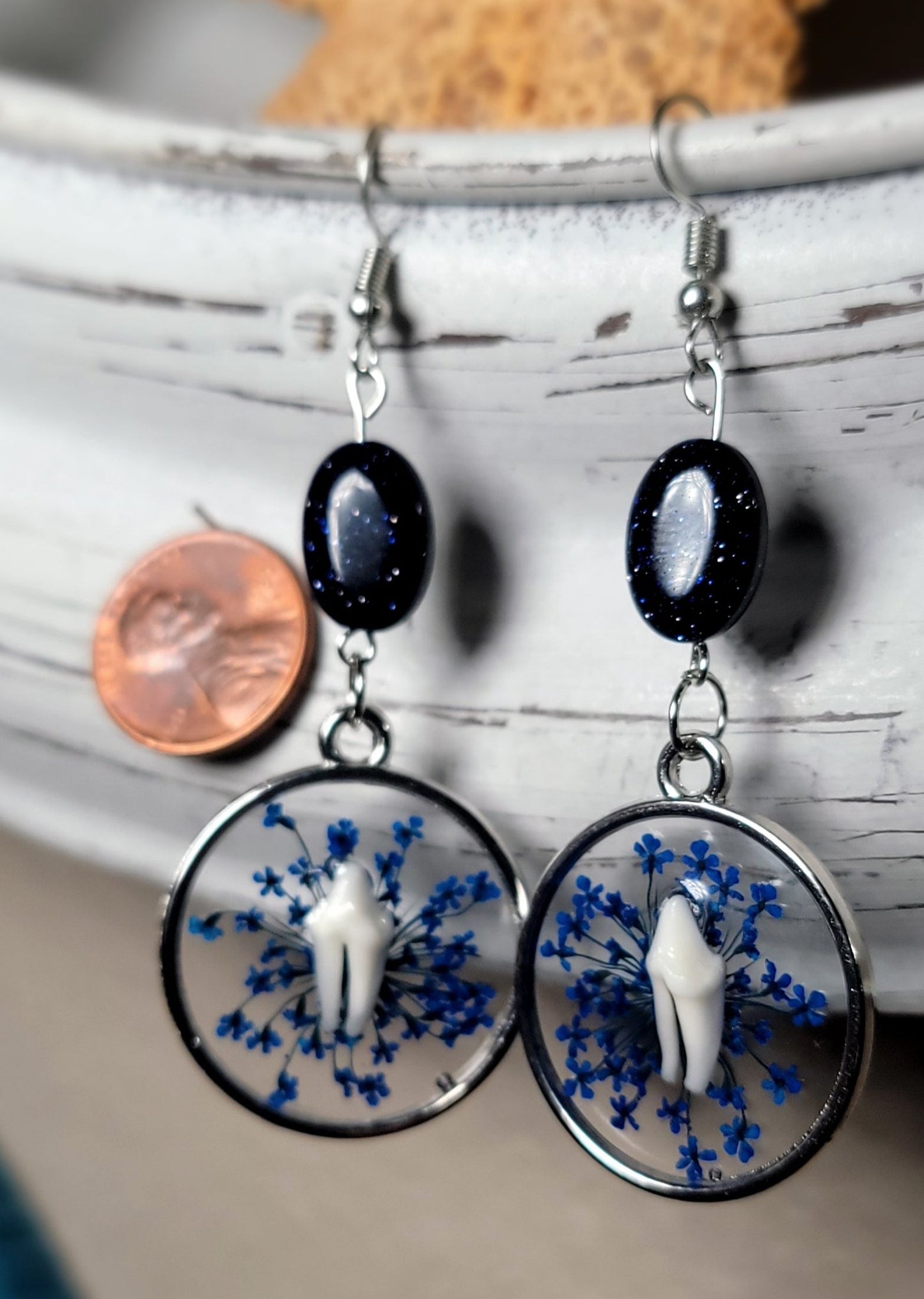 Raccoon Teeth with Dark Blue Floral Earrings