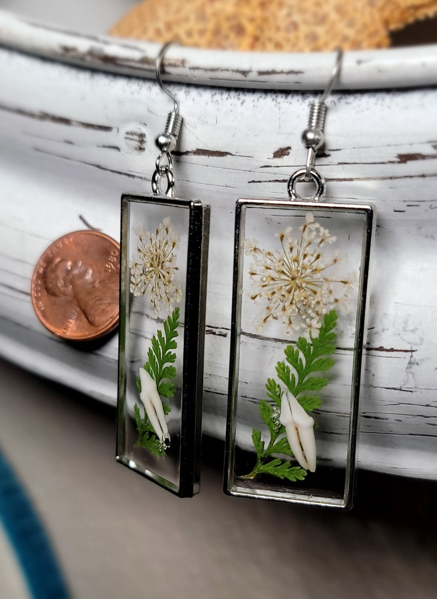 Raccoon Teeth with White and Green Floral Earrings