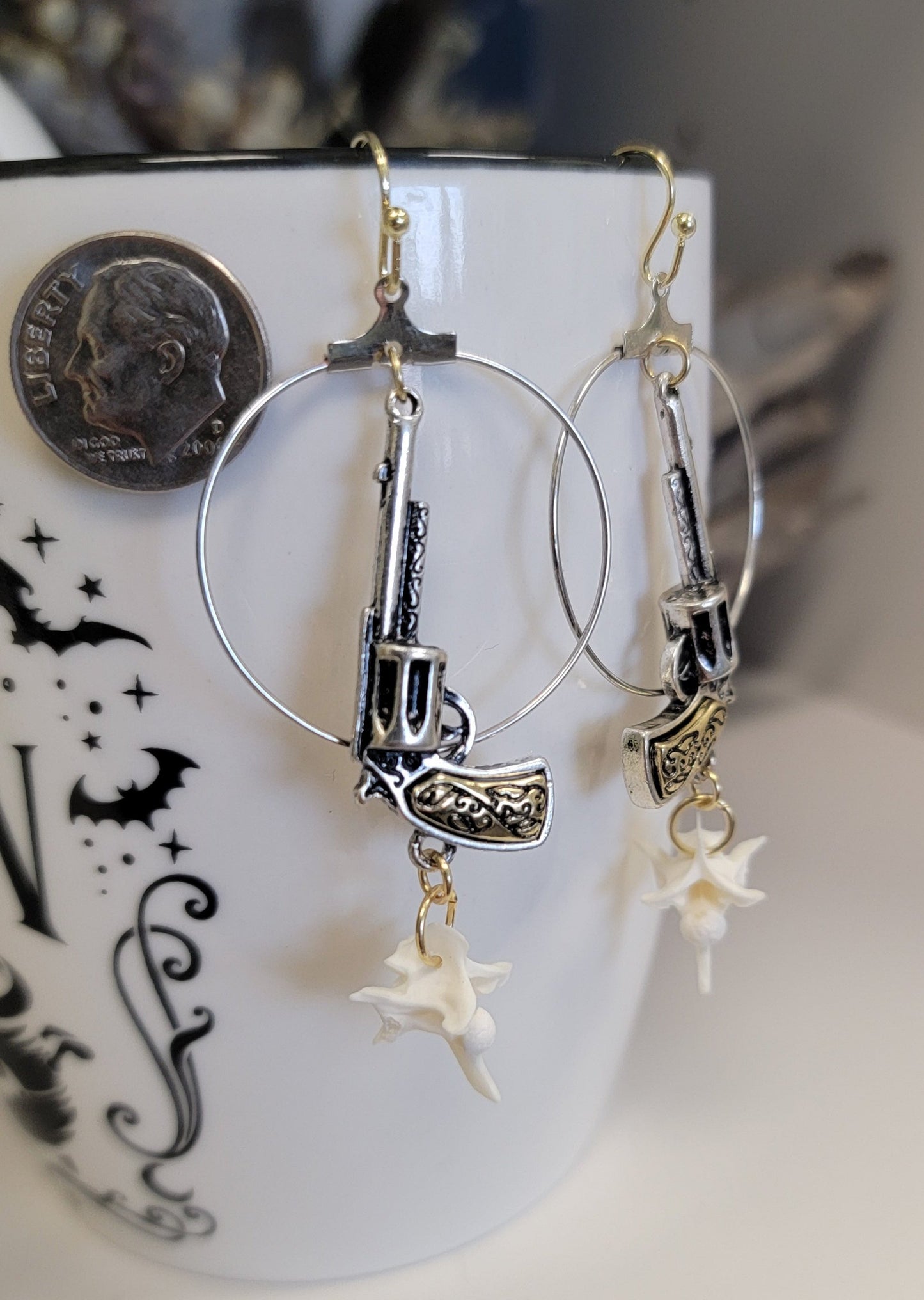 Gold and Silver Pistols with Rattlesnake Bones Earrings