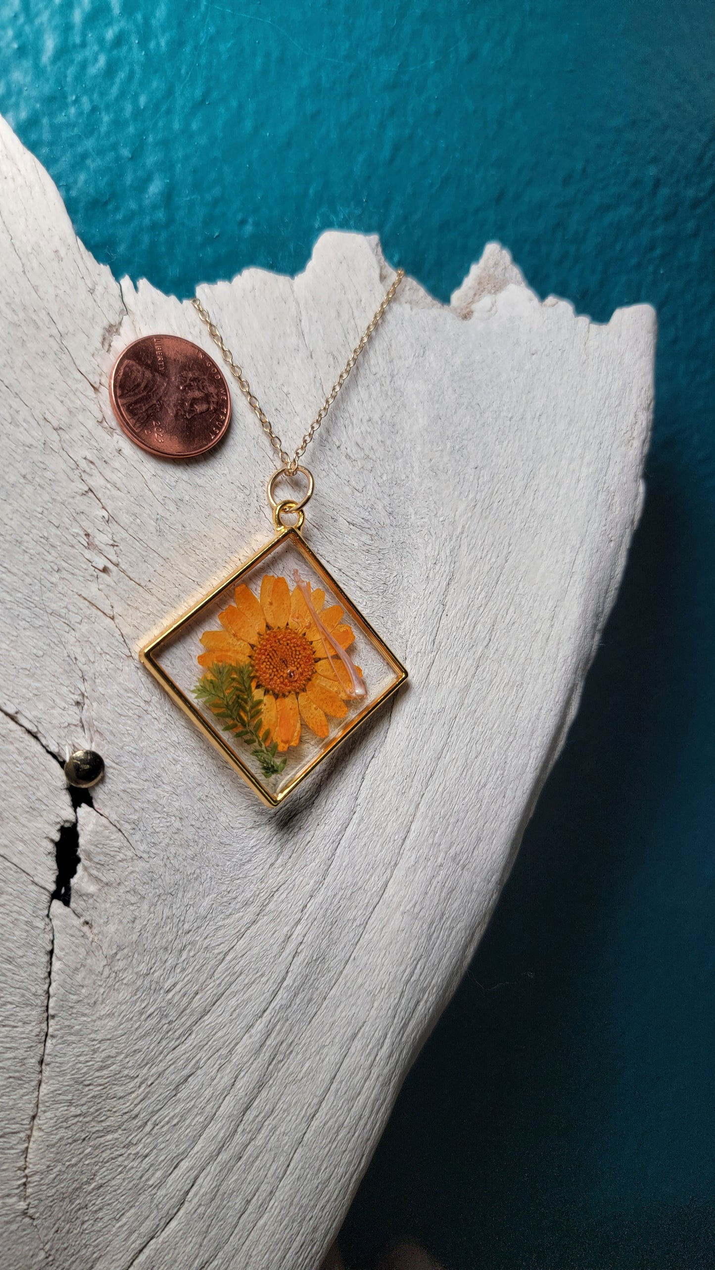 Gold Diamond and Rodent Leg and Orange Flower Necklace