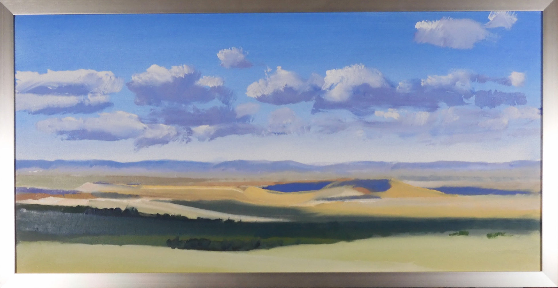 "Forever Afternoon " Framed Original Oil Painting Artist: Jon Madsen  Original Oil&nbsp; painting  Clouds over a beautiful late summer prairie   Mountains in distance  Lake in the mid ground  30" long x 12 " high original oil  31" long x 13 " high framed   Silver frame   D-ring and wire on the back for hanging  Please note item is an original from the artist