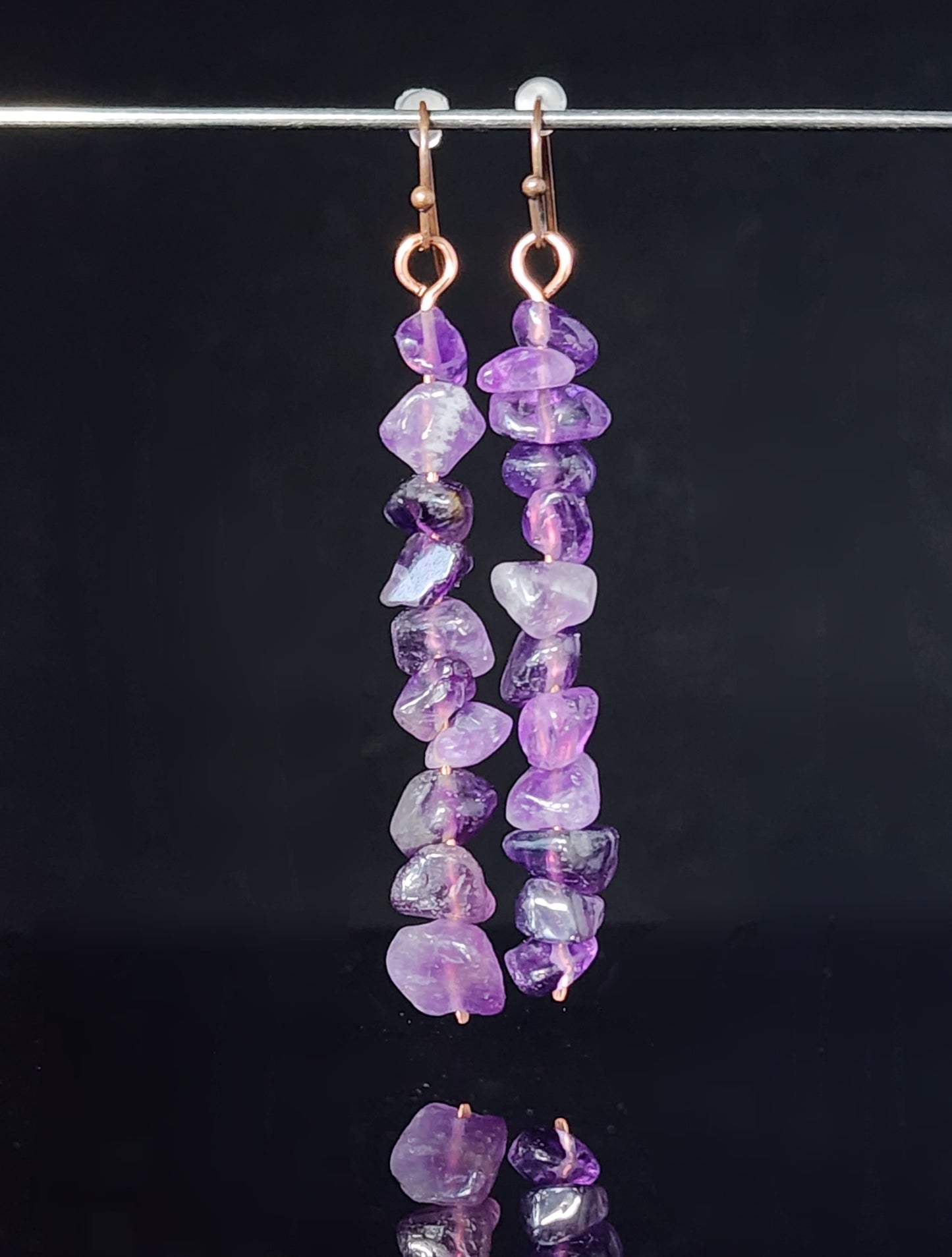 Amethyst Chip Dangle Earrings Artist: Lindsey Griffin   Copper earrings with amethyst chips   Dangle earrings with chips of turquoise   Copper ear wires   2" long x&nbsp; 1/4" wide