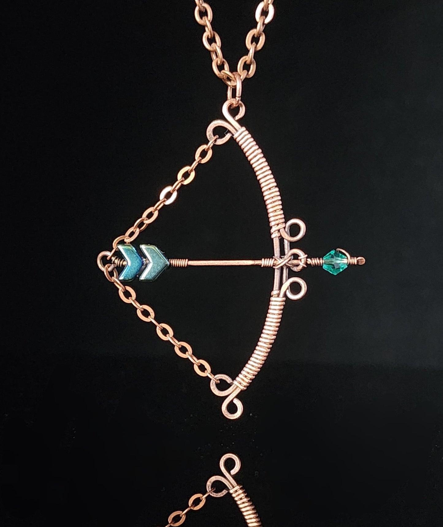 Bow and Arrow Pendant with Green Beads