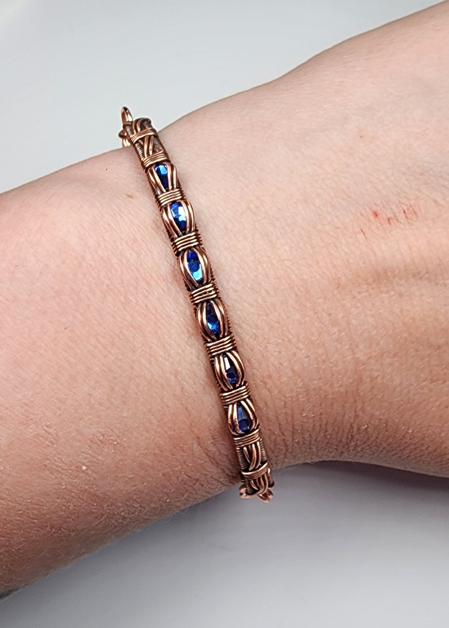 Channel Set Bracelet with Blue Beads