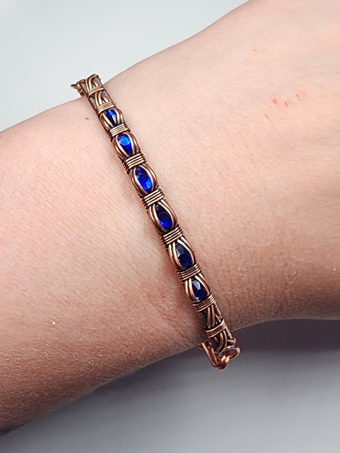 Channel Set Bracelet with Dark Blue Beads